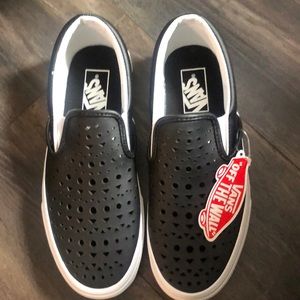 Vans, classic, back, slip-on with perforated pattern.